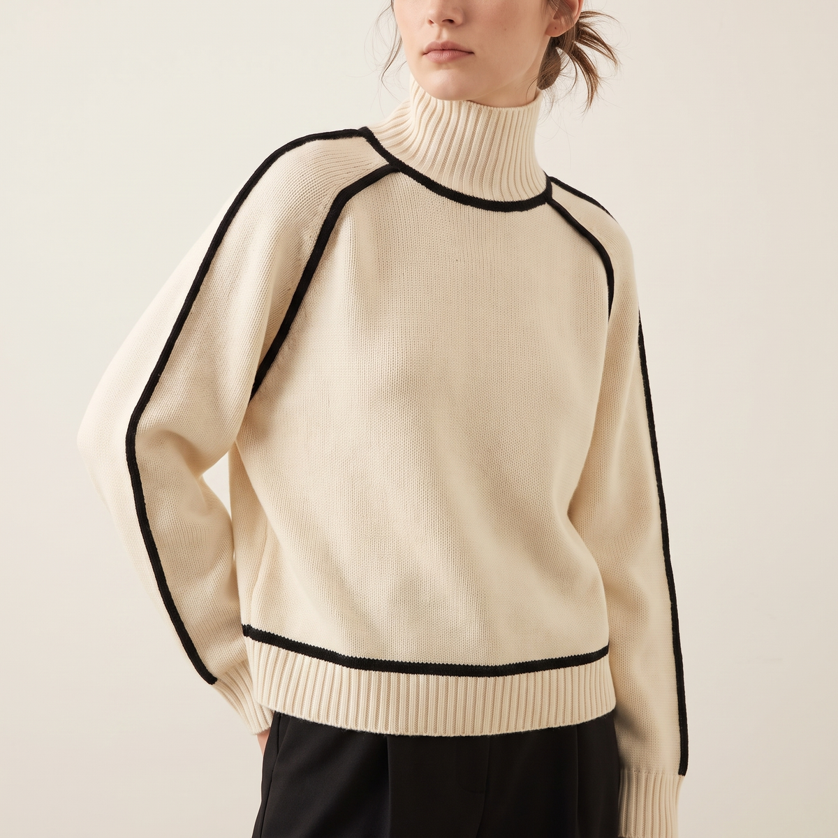Contrast-Piped Turtleneck Sweater in Cream, 3/4 angle