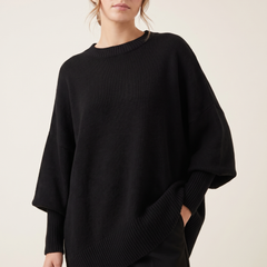 Women's Asymmetric Batwing Poncho Sweater in Black, 3/4 angle