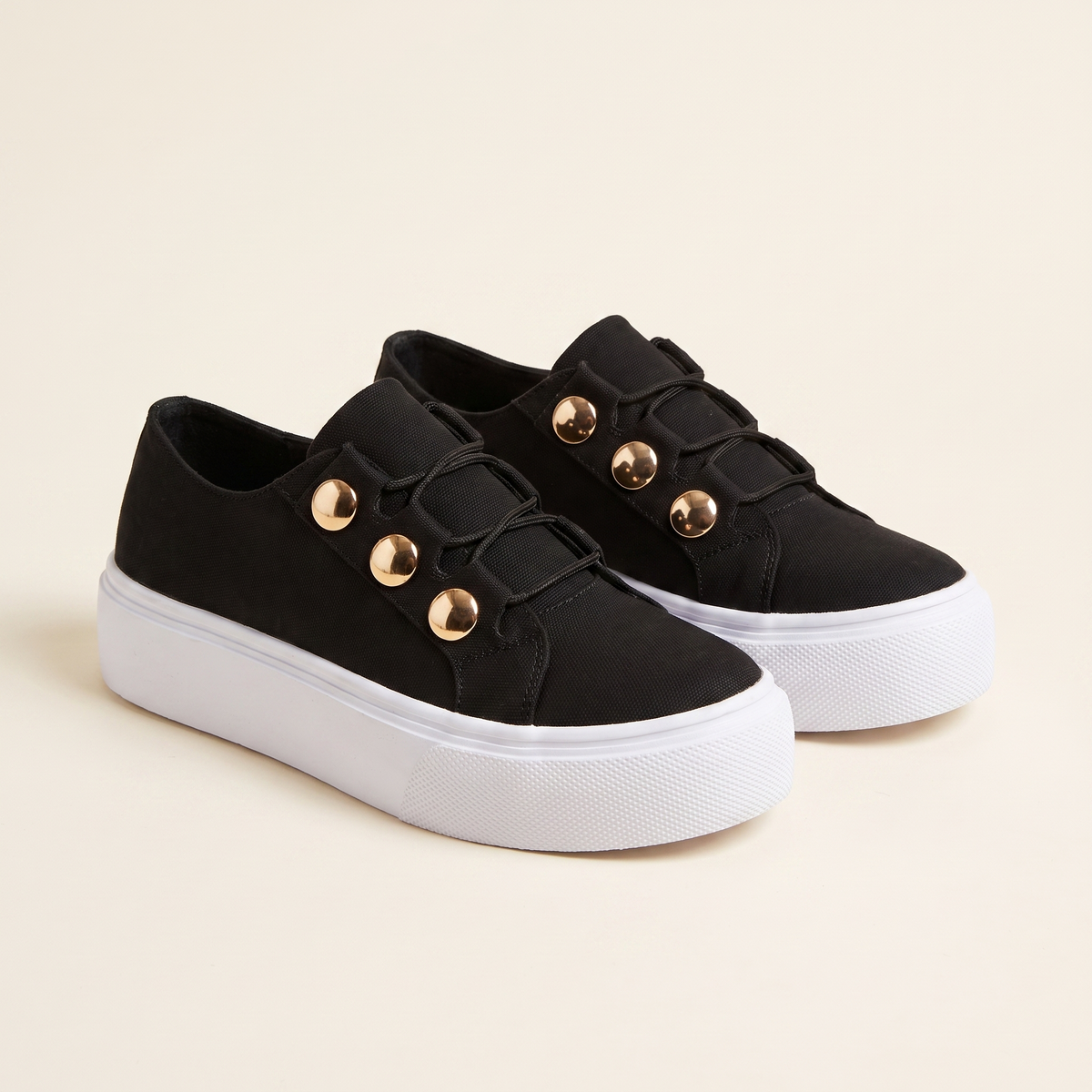 Women's Gold-Stud Platform Trainers in Black, pair 3/4 angle