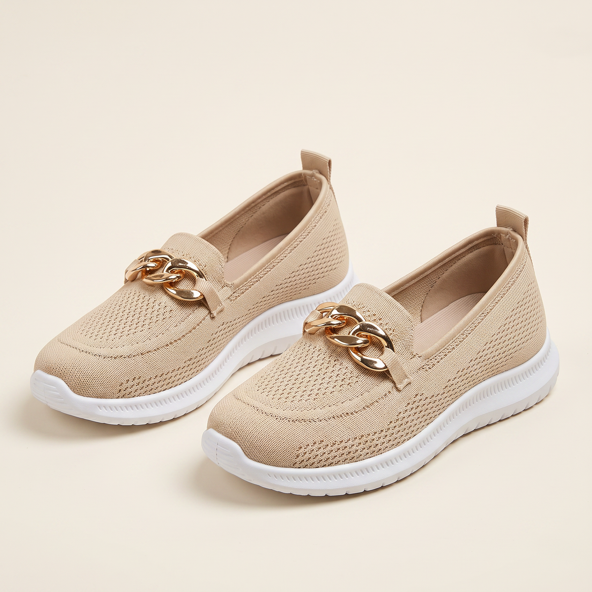 Women's Chain-Trim Knit Slip-On Sneakers in Beige, pair 3/4 angle