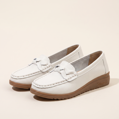 Women's Braided Moccasin Loafers in White, pair 3/4 angle