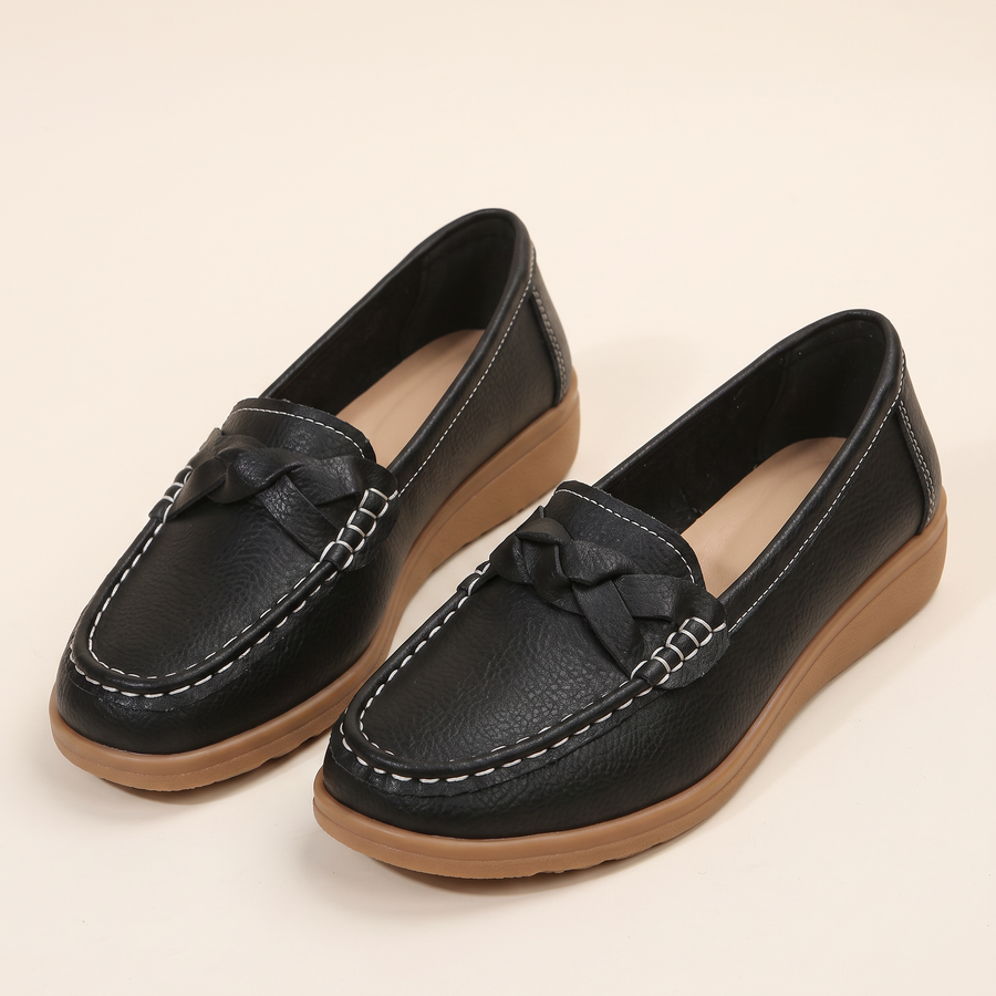 Women's Braided Moccasin Loafers in Black, pair 3/4 angle