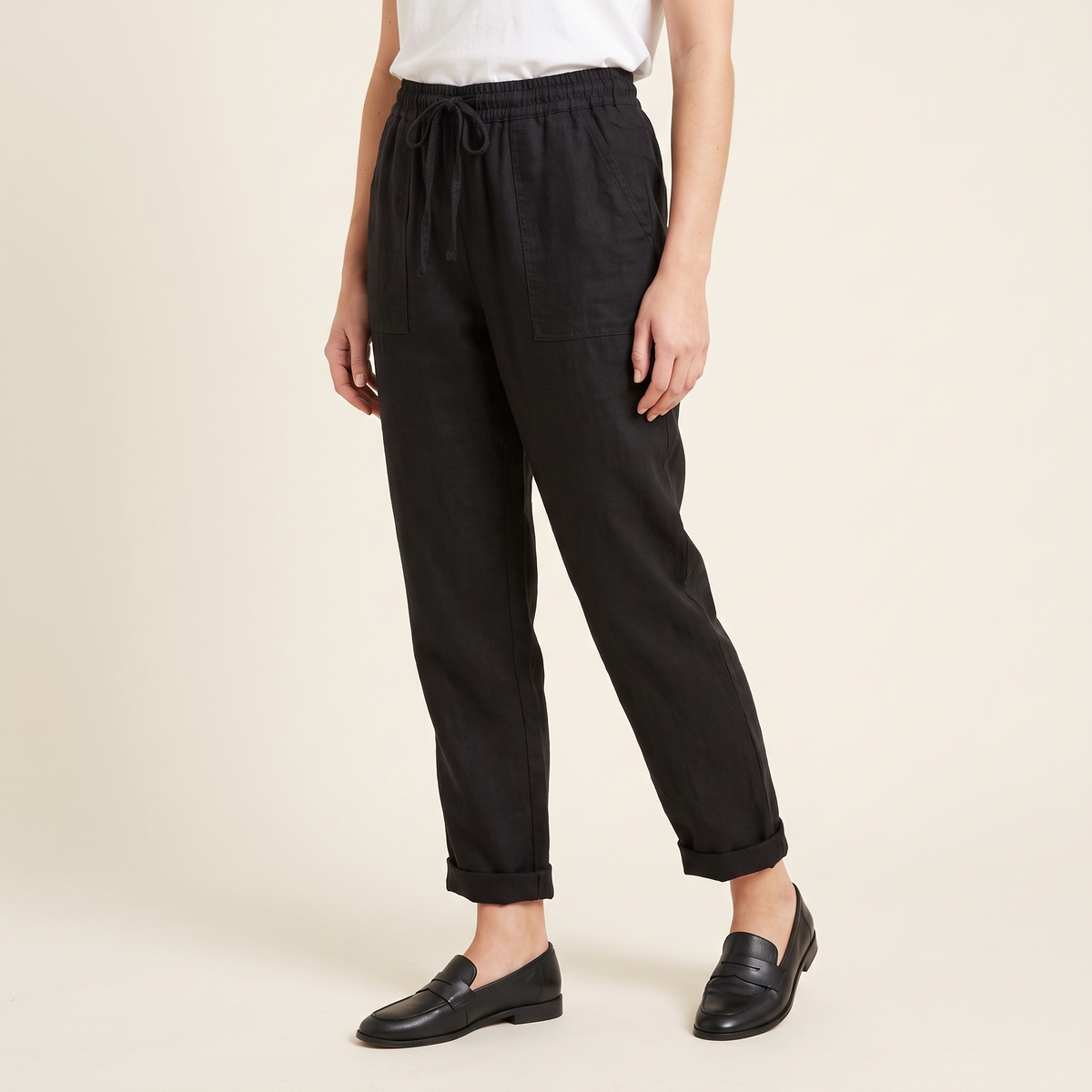 Women's Textured Drawstring Trousers in Black, 3/4 angle